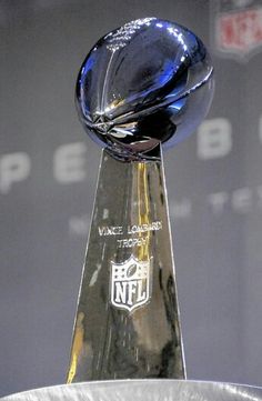 the nfl super bowl trophy is on display