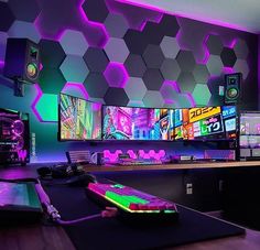 a room with many monitors and sound equipment