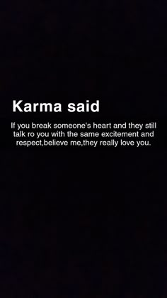 the words karma said on a black background