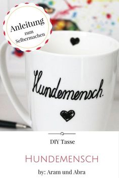 a coffee cup with the words, i love you and two hearts in german on it