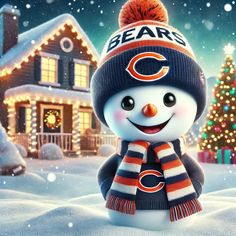 a snowman wearing a chicago bears hat and scarf