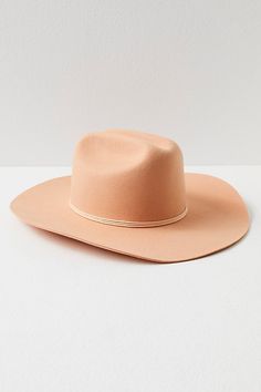 Taking cues from classic Western style, this vintage-inspired cowboy hat can instantly elevate any look. **Features:** Structured style, wool felt fabrication, dipped crown, wide upturned brim, rope accent **Why We | Ridge Felt Cowboy Hat by Lack of Color at Free People in Pink, Size: M Western Fur Felt Fedora For Spring, Western Style Fur Felt Fedora For Spring, Western Wool Hat Band For Spring, Western Wool Hat Bands For Spring, Western Style Felt Hat For Ranch In Spring, Western Felt Hat For Spring Ranch, Rigid Fedora Felt Hat For Rodeo, Classic Spring Felt Hat For Rodeo, Spring Wool Felt Hat With Curved Brim