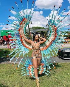 a woman dressed in an elaborately designed costume