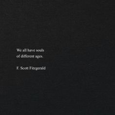 we all have souls of different ages f scott fitzgerald quote on black paper background