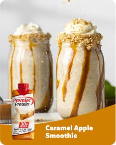 caramel apple smoothie in two jars with peanut butter on top and an empty bottle next to it