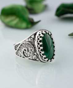 Malachite Silver Statement Ring 925 Sterling Silver Artisan Made Handcrafted Boho Filigree Cocktail Ring Handmade Women Jewelry, gift ring for her Material: 925 Sterling Silver ( NICKEL FREE ) Gemstone: Malachite 7x14 mm FREE, FAST AND TRACKABLE SHIPPING FOR ALL EU COUNTRIES AND USA. COMES WİTH VELVET POUCH AND LUXURY GİFT BOX. Show off this gorgeous green stone ring at any occasion. This eye catching ring is perfect to add glam to any outfit with Malachite Gemstone. This vintage, original, and stylish luxury jewelry is perfect for wearing at parties, festivals and everyday life.  Our handmade pieces are the perfect gift ring for her, mom, wife, daughter, friend, lover, relative, etc. ideal gift for birthday, anniversary, christmas, graduation, and mothers day, valentines, or any other spe Filigree Ring For May Birthstone Gift, May Birthstone Filigree Ring Gift, Green Sterling Silver Spiritual Rings, Green Filigree Jewelry As A Gift, Green Filigree Jewelry Gift, Green Oval Filigree Ring In Sterling Silver, Emerald Filigree Ring Gift, Emerald Ring With Filigree For Gift, Round Emerald Ring With Filigree For Gift