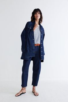 This longer take on the typical denim jacket makes for a stylish top layer for any look, smart of casual. Pair with the Denim Barrel Leg Pants for a bold denim vibe. Button down Hits at the thigh Side and breast pockets Collared Long Denim Jacket, Dressy Pants, Indigo Colour, Stylish Top, Dark Indigo, Great Lengths, Wide Leg Denim, Fashion Help, Silk Top