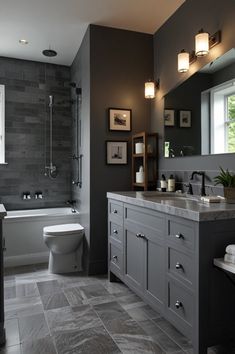 a bathroom with gray walls and tile flooring