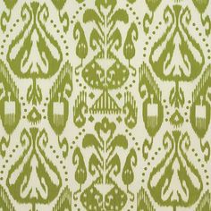 a green and white pattern on fabric