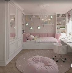 a bedroom with pink walls and white furniture