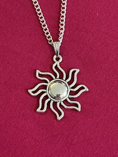 Happy sunny pendant. 1-1/4" diameter. Stainless steel.  Won't tarnish.  In stock.  Ready to ship.  ** FREE SHIPPING ** Silver Necklace With Sun Design In Metal, Silver Sun Design Metal Necklace, Silver Metal Necklace With Sun Design, Silver Medallion Necklace With Sun Design, Aztec Sun, Sun Necklace, Sun Pendant, Pendant Silver, Phoenix Az