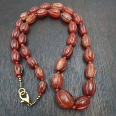 RARE Old antique Indo Tibetan Carnelian Agate Beads Melon Shape Beads necklace agate bead, dark brown Red color. This type of bead can be found in the Himalayan regions. Rare Melon shape.   Antique, with few nicks and very fine usage patina, it presents signs of age We try our best to describe items as detail as we can.and make photos as detail as we can. If you have any doubt about the detail, please contact Us. We promise the things you will receive are 100% same with the photos. Carnelian Agate, Make Photo, Old Antiques, White Heart, Agate Beads, Beads Necklace, Himalayan, Tibet, Melon