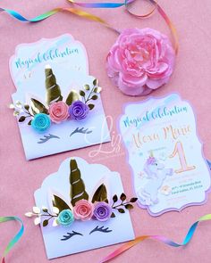 three unicorn themed birthday cards with flowers on them