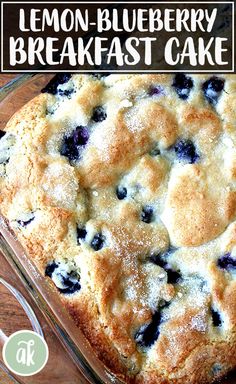 a blueberry buttermilk breakfast cake in a glass baking dish on a wooden table