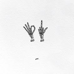 two hand drawn cacti on white paper