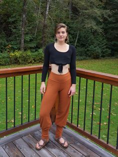 "Imagine leggings + straight leg merged into one pair of pants.   With their cozy high waist they are flattering, elegant and practical.   These warm bamboo fleece lined,  willow pants slip into boots, can be pulled up onto the calf and worn capri style, and look great with longer tunics & shorter shirts. The long cuff on the bottom is unique and funky, and allows the inseam to be flexible for 28\"-33\" inseam. Great for daily wear, yoga, dancing, hiking, gardening, and living life to it's fulle Fall Harem Pants For Loungewear, Straight Leg, Fall Straight Leg Harem Pants For Loungewear, Fall Relaxed Fit Brown Harem Pants, Fall Yoga Pants With Loosely Fitted Hips, Solid Non-stretch Harem Pants For Fall, Fall Solid Non-stretch Harem Pants, Loosely Fitted Brown Harem Pants For Fall, Fall Straight Leg Yoga Pants With Elastic Waistband, Brown Harem Pants For Fall