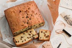 a loaf of cake sitting on top of a piece of wax paper