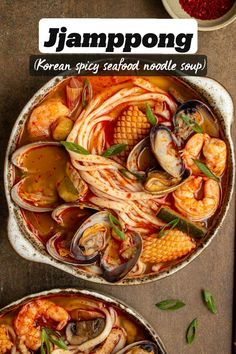 two bowls filled with seafood and vegetables on top of a wooden table