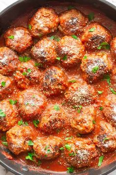 keto meatballs in a red sauce with parsley on top and text overlay that reads keto meatballs extra juicy, no grains low carb