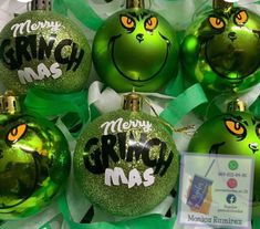 green christmas ornaments with the words merry grinmas on them