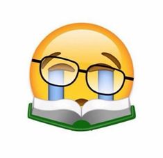 an emoticive smiley face with glasses reading a book