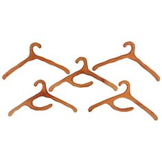 four wooden clothes hangers on a white background