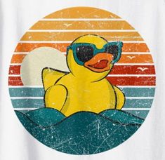 a t - shirt with a rubber duck wearing sunglasses