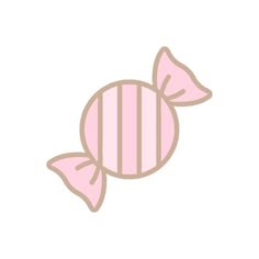 a pink candy fish sitting on top of a white surface