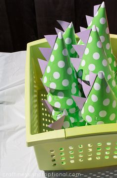 green and white paper trees in a basket