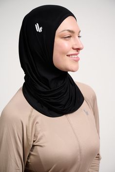 Created by us for us! A sports hijab that stays in place during your workouts while giving you a flattering look. This 2-piece sports hijab is lightweight and is easy to wear (no pins needed).The design is adjustable to suit your face, and makes you look good while exercising. It can be worn with or without the under cap and creates natural drapes. (Say goodbye to your old egg-shaped sports hijabs!) Fabric is breathable, sweat-wicking and cool. Extremely lightweight; can easily be tucked into your shirt. The design creates beautiful pleats. No more egg-shaped head! Stretchy fabric stays in place during high intensity workouts. Ethically made. FACE OPENING HEIGHT: S/M: 22cm (stretches to 26cm) L/XL: 24cm (stretches to 30cm) Lightweight Black Activewear For Gym, Lightweight Black Yoga Activewear, Black Lightweight Yoga Activewear, Lightweight Black Activewear For Yoga, Lightweight Breathable Black Activewear, Lightweight Moisture-wicking Black Activewear, Lightweight Black Activewear For Sports, Black Lightweight Activewear For Sports, Sports Hijab