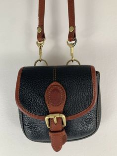 Vintage Mini Leather Saddle Crossbody Purse Liz Claiborne Brwn Blk Leather Retro. Leather super thick and quality. They don’t make bags like this anymore! Crossbody. Great condition. Coolest little retro bag! Vintage Black Bags With Leather Backing, Vintage Black Shoulder Bag With Snap Closure, Vintage Black Shoulder Bag With Leather Backing, Black Shoulder Bag With Coin Pocket For Travel, Black Leather Shoulder Bag With Coin Pocket, Black Shoulder Bag With Coin Pocket, Black Leather Bag With Coin Pocket, Black Shoulder Bag With Coin Pocket For Daily Use, Vintage Black Shoulder Bag With Brass Hardware