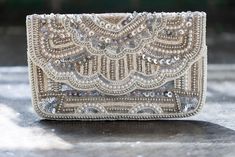 Elegant Rectangular Sequin Clutch, Glamorous Hand-embellished Evening Bag For Events, Elegant Beaded Clutch For Events, Glamorous Hand Embellished Evening Bag For Events, Elegant Hand Embellished Evening Bag For Events, Elegant Sequined Clutch Evening Bag, Elegant Sequined Evening Clutch Bag, Glamorous Wedding Clutch With Sequins, Elegant Sequined Evening Bag