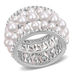 This exquisite piece showcases a sterling silver band adorned with an array of beautiful white button-shaped freshwater cultured pearls and sparkling lab-created white sapphires. Immerse yourself in the timeless elegance and sophistication this ring brings, making it a truly enchanting accessory for any occasion. | Pearl and Lab-Created White Sapphire Ring | Sterling Silver | Size 6 | 2mm | Helzberg Diamonds White Pearl Rings With Diamond Accents, Silver Akoya Pearl Rings With Diamond Accents, Silver Pearl Rings With Diamond Accents, White Pearl Jewelry With Sparkling Stones, Silver Rings With Diamond Accents And Pearl, Classic White Cubic Zirconia Pearl Ring, Wedding Jewelry With Diamond Accents In Rondelle Shape, Formal Stackable Pearl Ring, Fine Jewelry, Formal Stackable Pearl Ring Fine Jewelry