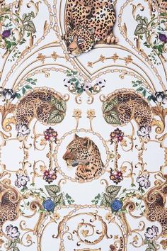 an intricately designed wallpaper with leopards and flowers