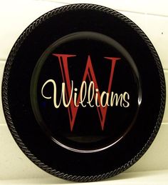 a black and red plate with the word williams on it