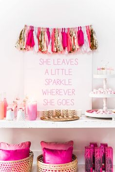 pink and gold birthday party with she leaves a little sparkle wherever she goes sign on the wall