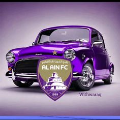 an old purple car with the name al ainfc on it's front end