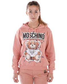 MOSCHINO Retail Price: 470,000€ Description New Item! 100% Original from our Store! See all Photos! Composition 100% Cotton 0% 0% 0% 0%   Features  MOSCHINO Mod.  V17055527 Colour Pink Size 40 SIZE CONVERTION ITALIA USA UK DE 38 6-XXS 6 32 40 8-XS 8 34 42 10-S 10 36 44 12-M 12 38 46 14-L 14 40 48 16-XL 16 42 Measures How are the measures taken? The cloth is stretched on a flat surface. Shoulders (4): from stitch to stitch of the shoulders. Chest (1): from stitch to stitch under the armpit. Lenght (2): from the internal stitch of the neck, to the end of the cloth. Sleeves (3): from the stitch of the Shoulder  to the end of the cuff. If the stitch on the shoulders lacks, the measures is taken from the stitch of the armpit. Armpit (5): from the stitch under the armpit , to the end of the clot Pink Cotton Hoodie With Logo Detail, Pink Hoodie With Logo For Winter, Pink Winter Hoodie With Logo, Pink Winter Hoodie With Logo Detail, Casual Pink Hoodie With Logo Detail, Pink Winter Sweatshirt With Logo Detail, Teddy Bear Hoodie, Moschino Sweatshirt, Girls Ankle Boots