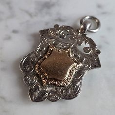 An Antique English Sterling Silver Watch Fob Medal That Is Believed To Be Made By J.W. Tiptaft. Fob Weighs 9.7g, And Measures 1 7/8" By 1 1/4". This Would Make A Nice Gift For That Someone Special. Any Questions Please Do Not Hesitate To Ask. Be Sure To Check Out Some Of My Other Great Items Up For Sale. Thank You Antique Engraved Silver Jewelry And Watches, Antique Silver Jewelry And Watches For Anniversary, Heirloom Style Engraved Jewelry And Watches As Gift, Heirloom Silver Jewelry With Screw Back, Heirloom Engraved Jewelry And Watches As Gift, Heirloom Engraved Jewelry And Watches For Gift, Engraved Silver Jewelry And Watches, Engraved Silver Round Jewelry And Watches, Silver Heirloom Jewelry And Watches As Gifts