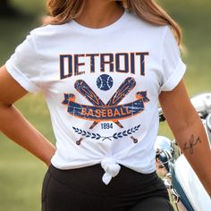 Please read the description completely and review all photos before ordering. Our Detroit Baseball Apparel is the perfect way to cheer on the home team this season. Ideal for game day, tailgates or everyday wear. Makes a great gift for any fan. This listing is for the distressed design. Click the link below for the non-distressed version: https://tandtapparel21.etsy.com/listing/1672213846/vintage-style-detroit-baseball-t-shirt SHIRT DETAILS Bella Canvas Unisex - Solid colors: 100% Cotton. - Heather colors: 52% Cotton + 48% Polyester - Runs true to size. (For looser or oversized fit consider going up a size or 2. See photos for size chart.) SWEATSHIRT & HOODIE DETAILS Gildan Heavy Blend Unisex - 50% Cotton + 50 Polyester - Runs true to size. (For looser or oversized fit consider going up a