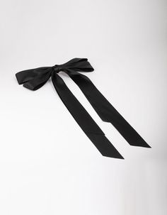 Bows are having their moment! Style the popular coquette trend with our selection of silky hair bows in a range of different colours. This black, oversized hair ribbon features an aligator clip at the back, perfect for styling in a half-up hairstyle. Dimensions: Length 460mm x Width 215mm Weight: 35g | Lovisa Black Fabric Oversized Ribbon Hair Bow Clip Hair Bow Clip, Bow Clip, Hair Ribbon, Ribbon Hair Bows, Ribbon Hair, Jewellery Accessories, Half Up Hair, Silky Hair, Bow Clips