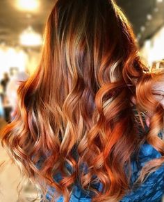 @paintedbyshannonlynn_ Custom Colored our Curly 18" Honey Blonde Tape Hair to achieve this beautiful copper color for her client! Right now is the perfect time to ask your stylist to give you this beautiful orange/copper Fall color. Good thing our extensions can be color altered to add some fullness/length to your natural hair. 😍 *Alterations are highly recommended to be done by professionals only* Long Extensions, Colored Hair Extensions, Hair Extensions Best