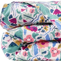 an image of a floral print comforter set on top of each other with the cover pulled down