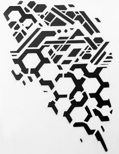 a piece of art that is made out of black and white paper with geometric shapes