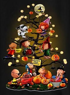 the peanuts tree is decorated with halloween characters