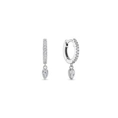 An everyday essential & best seller for a reason. This mini huggie earring is crafted with a row of sparkling pavé cz diamonds and accented with a single diamond teardrop that hangs delicately off the ear. Size: Inner Diameter 8mmStone: Cubic ZirconiaMaterials: Sterling Silver & 14K Gold Vermeil Everyday Teardrop White Gold Huggie Earrings, Everyday White Gold Teardrop Huggie Earrings, Sterling Silver Teardrop Huggie Earrings, Everyday Sterling Silver Teardrop Diamond Earrings, Elegant Sterling Silver Huggie Earrings With Dangling Charms, Everyday Teardrop Diamond Earrings With Accents, Fine Jewelry Teardrop Huggie Earrings With Diamond Accents, Teardrop Huggie Earrings With Diamond Accents, Everyday Teardrop Huggie Earrings