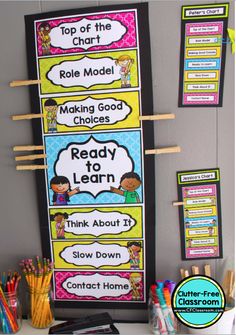 a classroom poster with the words ready to learn on it and some pencils next to it