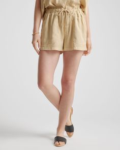 Made from a soft, drapey fabric, these shorts feature angled front and back patch pockets. P. S. they pair perfectly with the camp shirt.  | Quince | Women's Vintage Wash Utility Shorts in Light Khaki, Size Large, Tencel Utility Shorts, Silk Cami, Quarter Zip Sweater, Camp Shirt, Cute Sets, Just Run, Back Patch, Camping Shirt, Matching Top