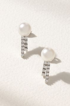 Mizuki's earrings are the perfect way to add subtle sparkle to everyday looks. Cast from polished 18-karat white gold, they're set with two Akoya pearls and rows of light-reflecting diamonds suspended from the main stud. Their small shape makes them easy to stack with similar styles. Classic White Gold Earrings With Timeless Design, Classic White Gold Earrings, Elegant Platinum Diamond Earrings For Formal Occasions, Elegant Timeless Earrings For Anniversary, Timeless Fine Jewelry Diamond Earrings For Formal Occasions, Formal Fine Jewelry Diamond Earrings With Timeless Design, Elegant Earrings With Timeless Design, Classic White Gold Pearl Earrings, Elegant Diamond Earrings With Timeless Design