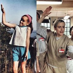 two women in scrubs and one is holding her hand up to the sky while other people are standing around